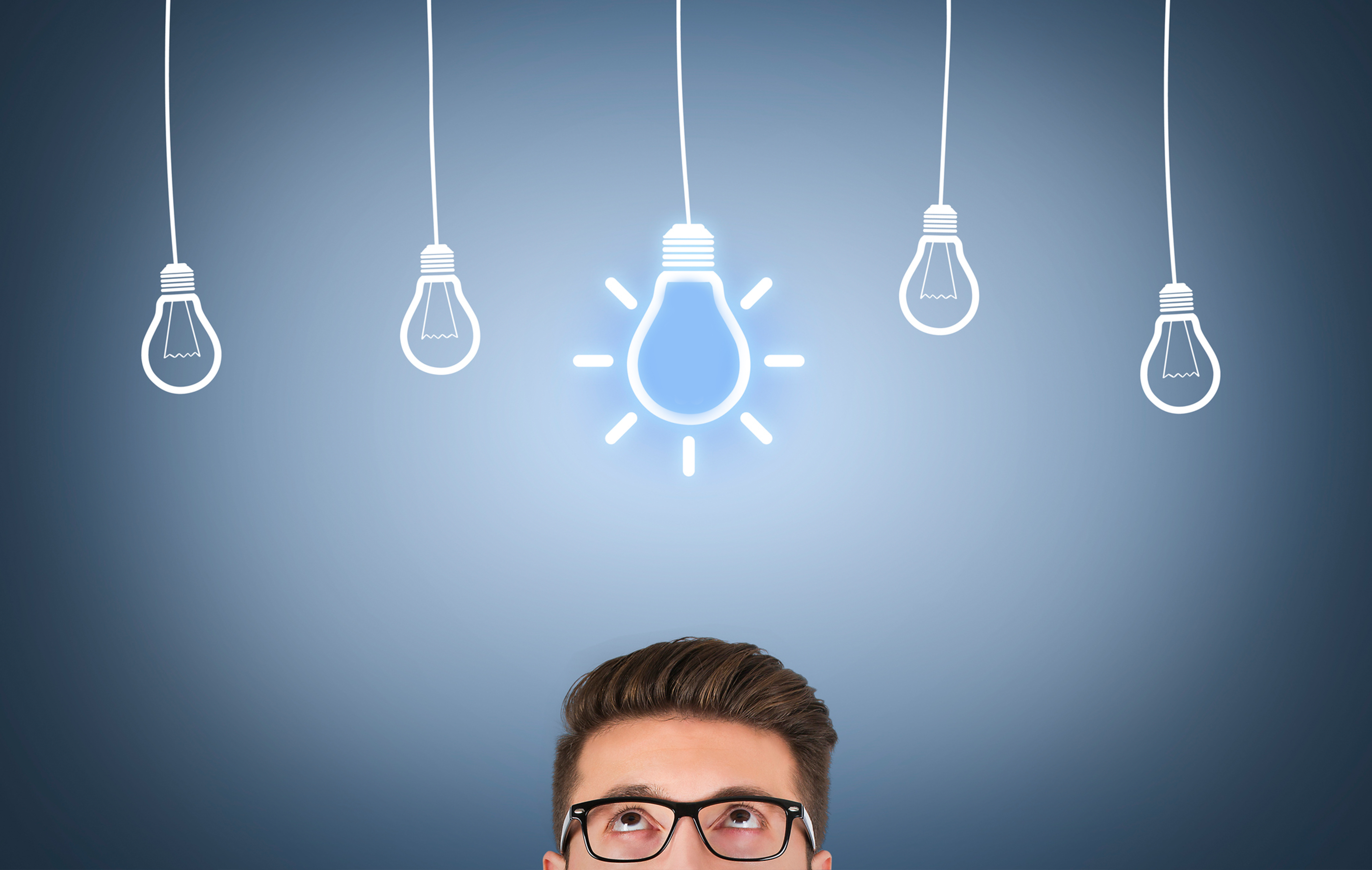 man with a bright lightbulb over his head